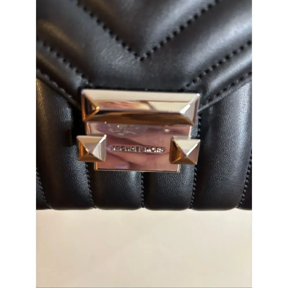 Michael Kors dimensions 8x9”